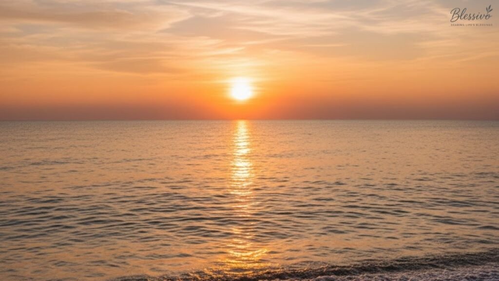 Golden sunset over peaceful fields and calm water — representing reflection, rest, and gratitude in evening afternoon blessings.